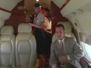 Horny stewardesses suck their clients hard johnson on the plane