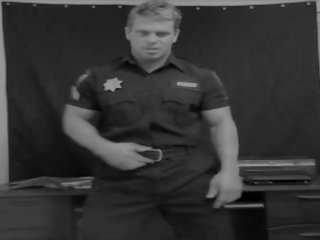 Muscle jock police officier bandes et taquine