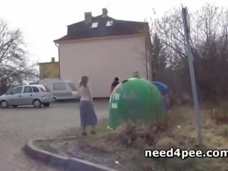 Roller mistress squats to piss on the side of the road