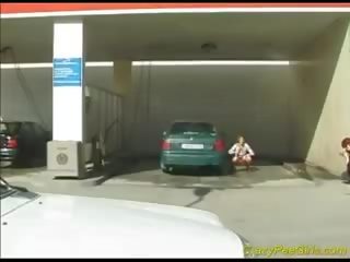 Gal Peeing In Car Washing