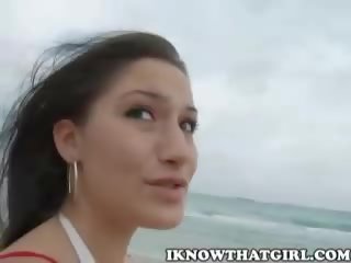 Sasha delightful teen stunner with big ass and natural tits having fun on the beach